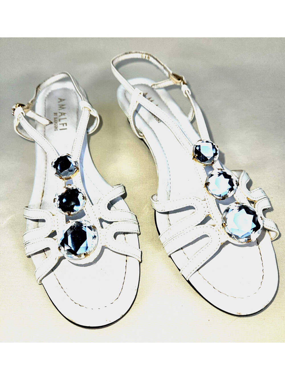 Amalfi White Patten Leather T-Strap Flat Sandal With Rhinestone Embellishments